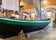Traditional Icelandic fishing boat displayed inside Hnjotur Museum in the Westfjords..jpg