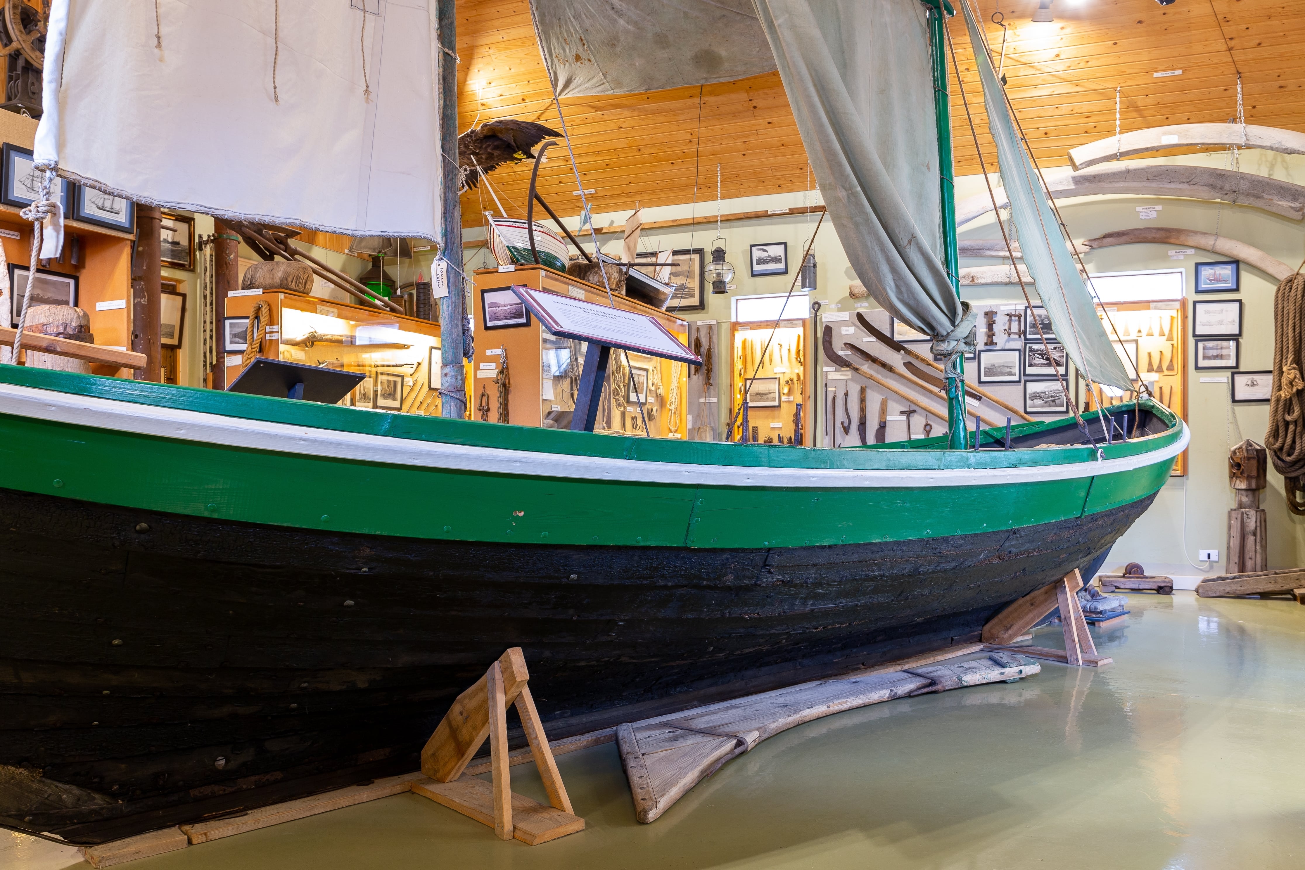 Traditional Icelandic fishing boat displayed inside Hnjotur Museum in the Westfjords..jpg