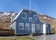 Exterior of the Sudavik Arctic Fox Center with mountain backdrop in Westfjords, Iceland..jpg