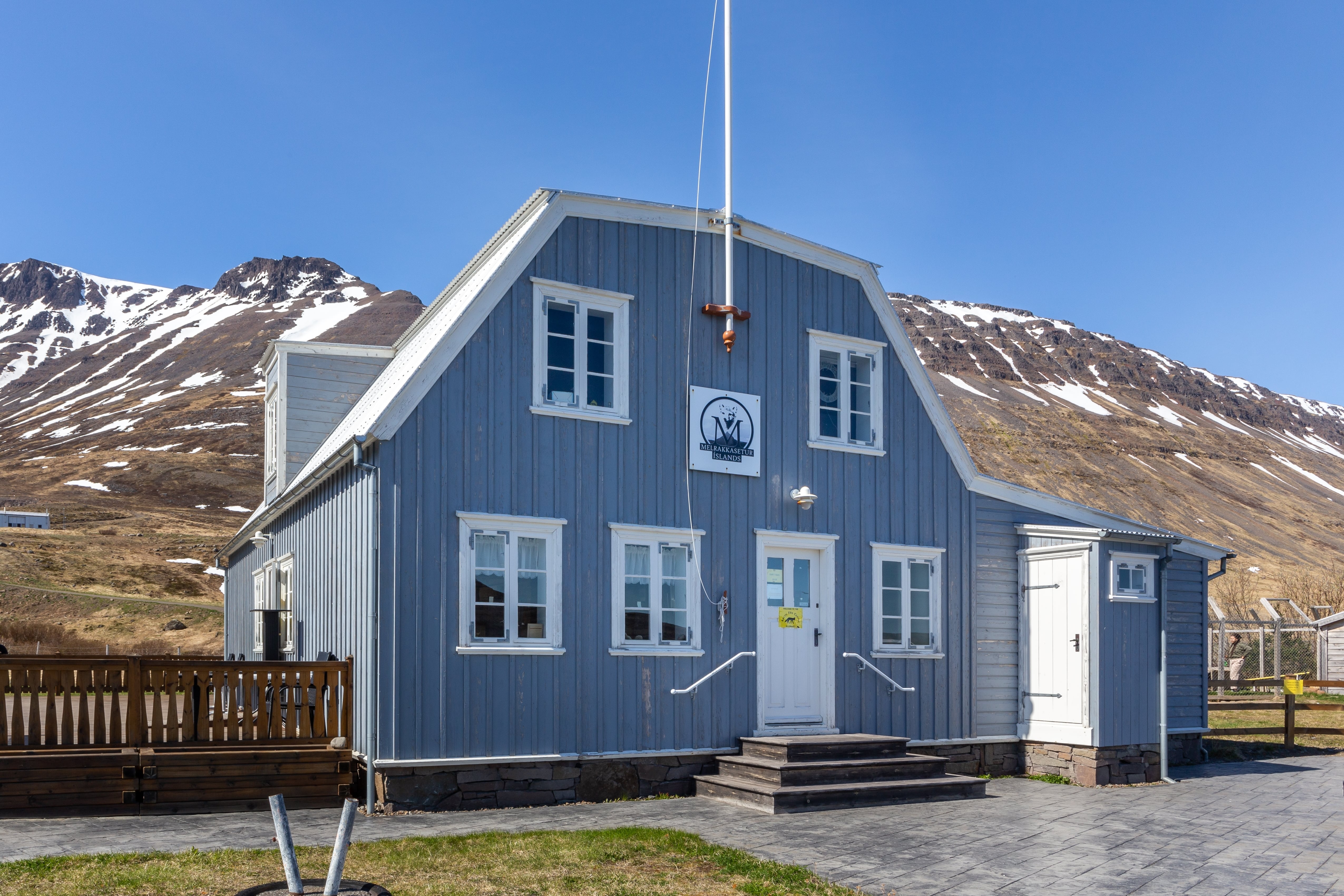 Exterior of the Sudavik Arctic Fox Center with mountain backdrop in Westfjords, Iceland..jpg