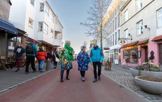 Travelers enjoying a private walking tour in Reykjavik with a Viking guide.