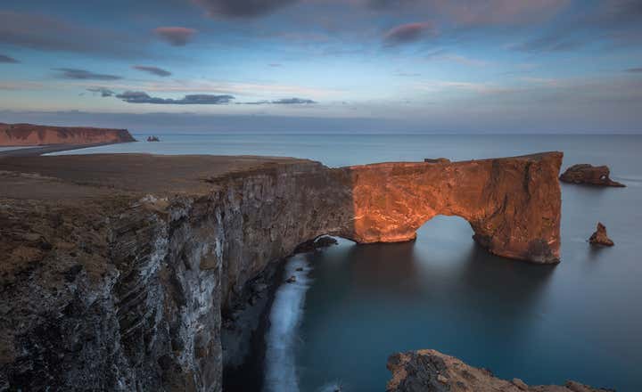 Dyrhólaey Peninsula is a 120 metre promenade famed for its staggering views of Iceland’s South Coast, as well as its historic lighthouse and wealth of birdlife.