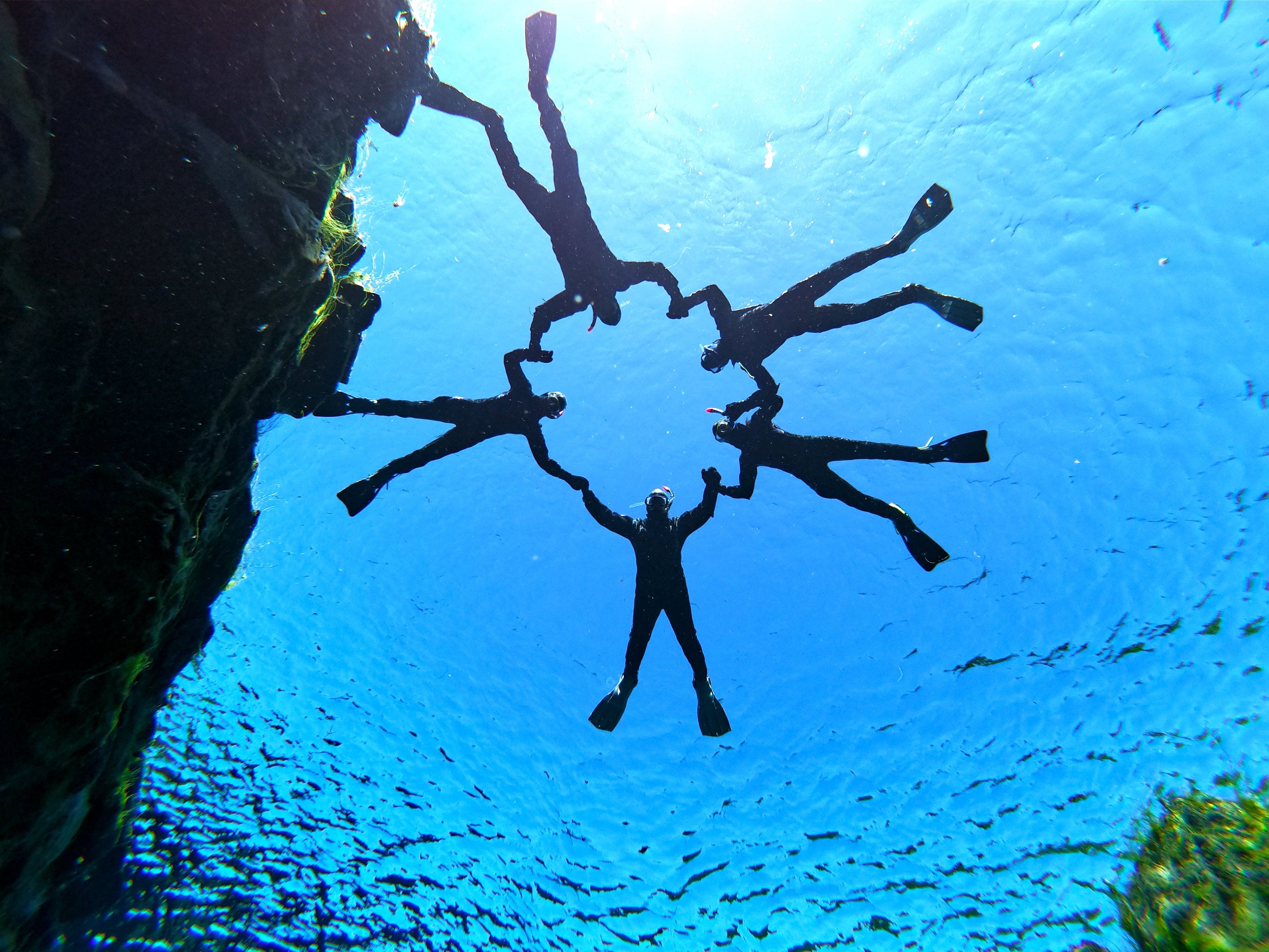 The clear waters of the Silfra Fissure provide incredible underwater photo opportunities.