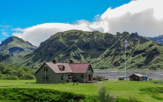 A mountain hut on a flat area at the mouth of Langidalur in Thorsmork.