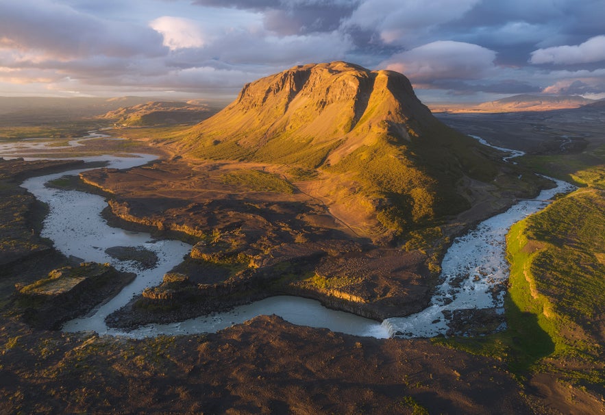 Thjorsa River winding around the Burfell Mountain, with Thjofafoss Waterfall