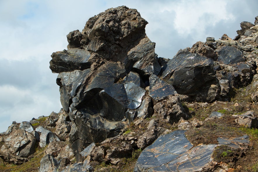 Obsidian rocks along the Landmannalaugar-Hrafntinnusker hiking trail in Iceland’s Highlands.
