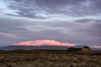 Bryggjur cottage is a spacious and luxurious log cabin surrounded by beautiful farmland, with views out to Eyjafjallajokull volc