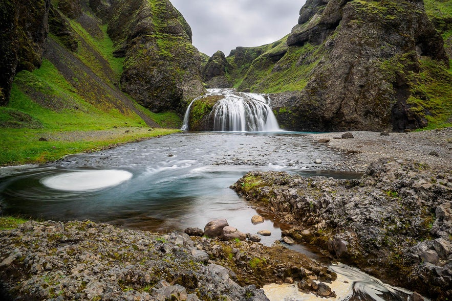 Stjornarfoss waterfall is a less popular but very stunning waterfall in the Icelandic South Coast. Stjornarfoss waterfall is a less popular but very stunning waterfall in the Icelandic South Coast.
