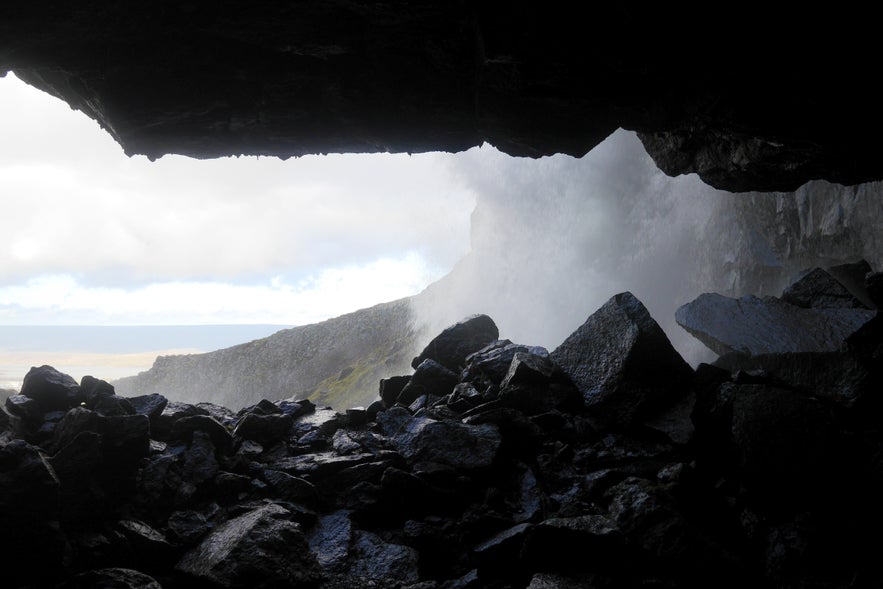 The ruins of the collapsed cave behind Fardagafoss waterfall.