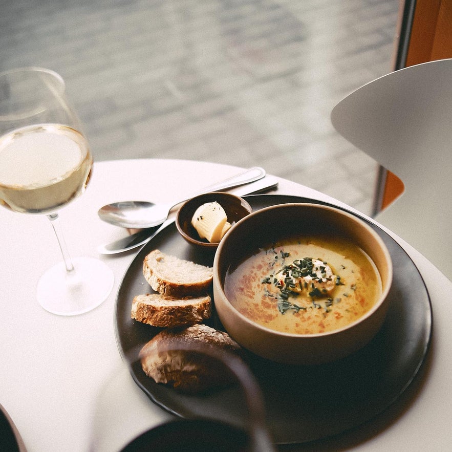 Creamy soup with bread and white wine, served at Ketilkaffi in Akureyri.