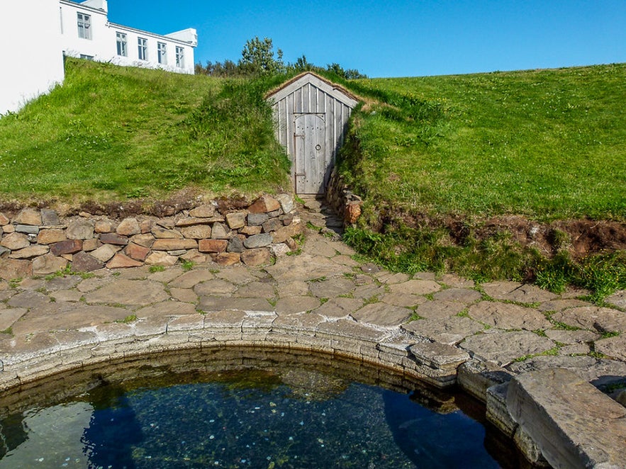 The Snorralaug geothermal pool is approximately 67 miles (about 108 kilometers) north of Reykjavik.