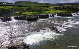 Trollafossar waterfall near Fossatun in West Iceland.