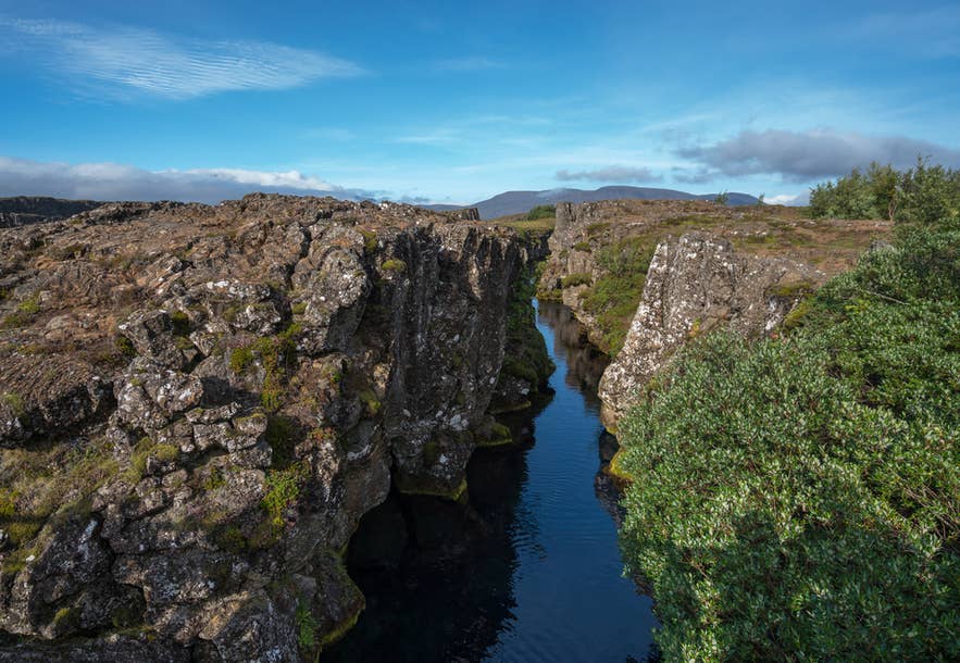 Silfra Fissure at Thingvellir National Park, near Saxholl, part of the Mid-Atlantic Ridge where visitors dive and snorkel.