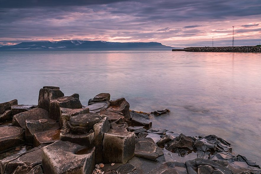 Basalt structures by the waterfront in Hofsos, North Iceland.