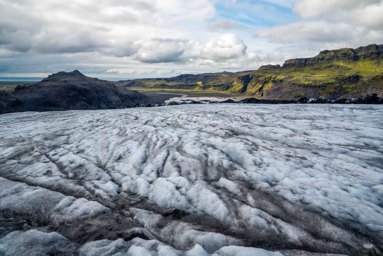 The rugged terrain of Solheimajokull glacier is exciting for both beginners and experienced hikers.