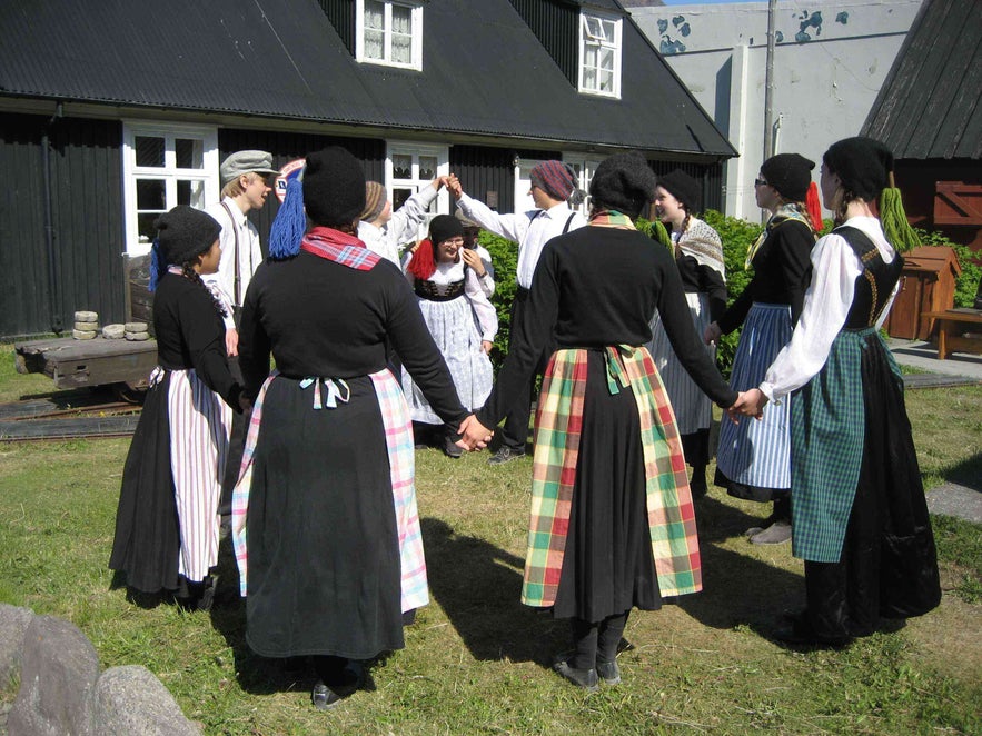 Folk dancers outside the Westfjords Heritage Museum in Isafjordur Folk dancers outside the Westfjords Heritage Museum in Isafjordur