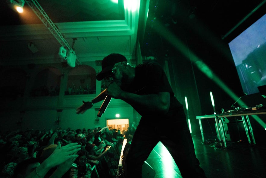 A music artist performing at a concert produced by Liveproject in Iceland.