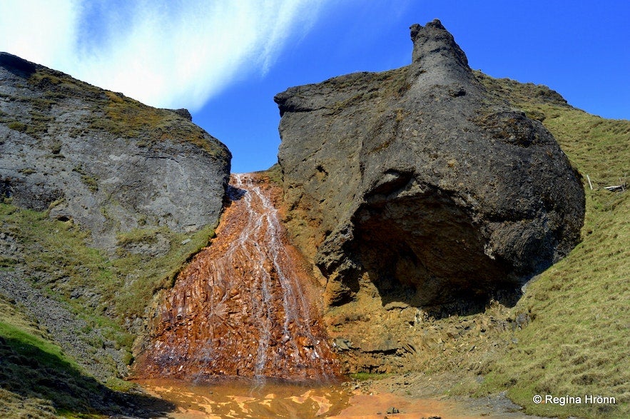 The red basalt column of Raudarfoss waterfall. The red basalt column of Raudarfoss waterfall.