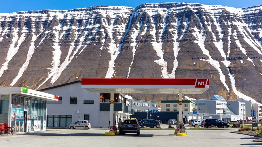 A car refuels at an N1 petrol station in a small Icelandic town