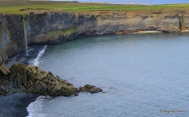 Sheer cliffs and waterfalls produce a striking landscape at the Ketubjorg Cliffs