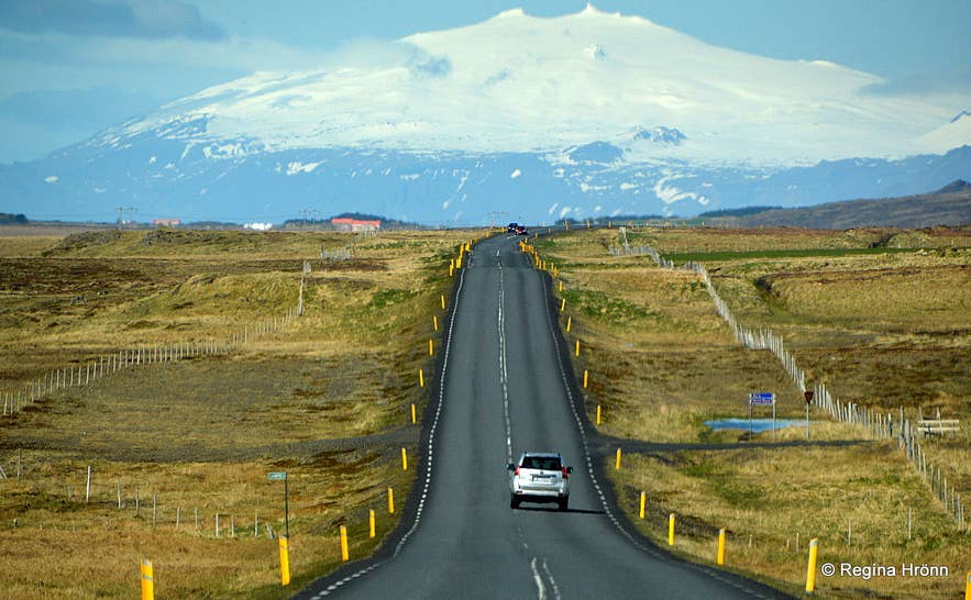 Road on the Snaefellsnes Peninsula leading toward the snow-covered Snaefellsjokull Glacier.