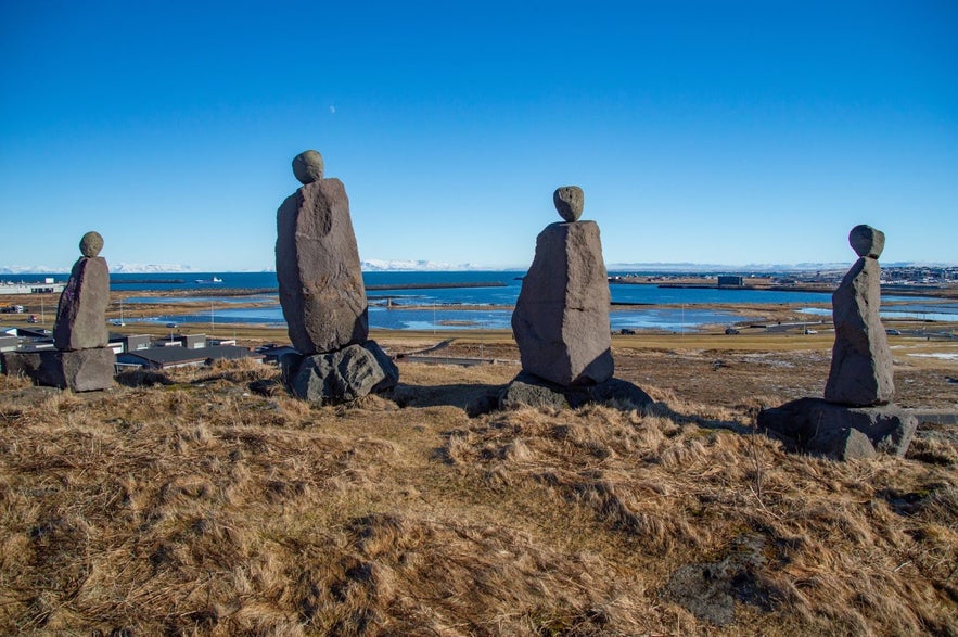  The Anchor Monument stone sculptures overlooking the sea in Keflavik, with coastal views.