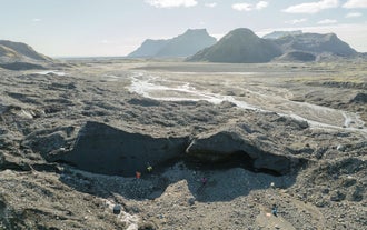 Surveyors explore a glacier cave during the Ice Mapping Expedition at Katla Glacier in Katla Geopark in South Iceland.