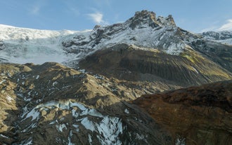 Krossarjokull Glacier in Katla Geopark with ice formations and rugged volcanic terrain in South Iceland.