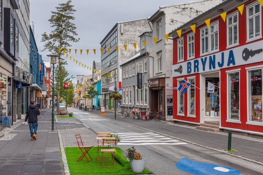 Shops and colorful buildings along Laugavegur Street in downtown Reykjavik.