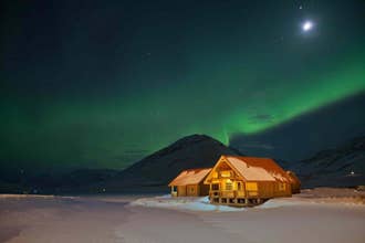 During winter its easy to see the aurora borealis from the outside of Brimnes Cabins' cottages.