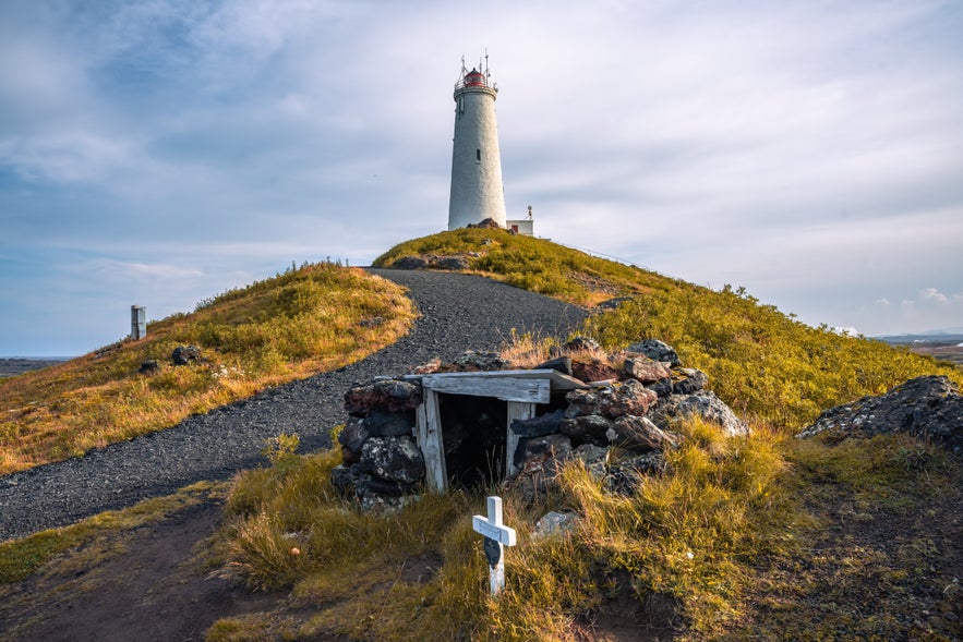 The Reykjanes Lighthouse on top of a hill in Iceland.