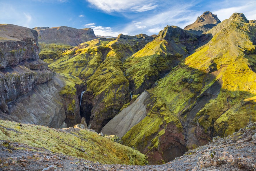 Colorful moss-covered mountains and canyon ridges at Thakgil Canyon in South Iceland.