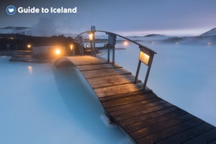 The footbridge is surrounded by the ethereal water of the lagoon.