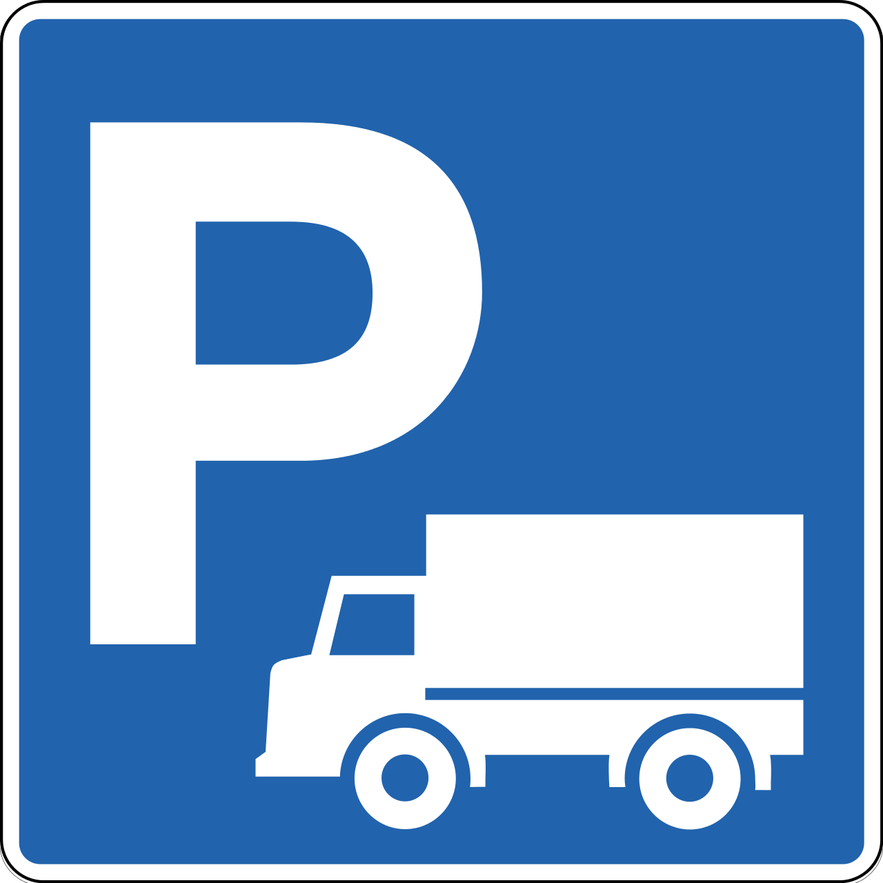 A blue square sign in Iceland with a white letter P and a picture of a truck, indicating parking for trucks.