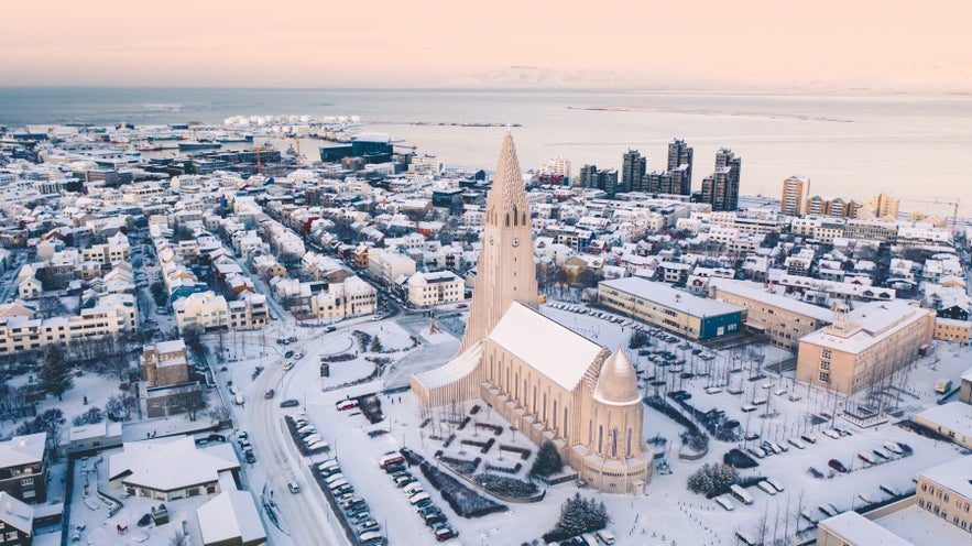 Hallgrímskirkja Church in winter snow with sunrise
