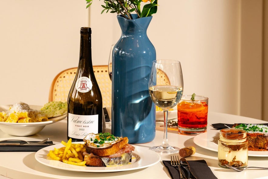 Brunch with wine and gourmet dishes at Terían Brasserie in Hotel Kea, Akureyri, Iceland.