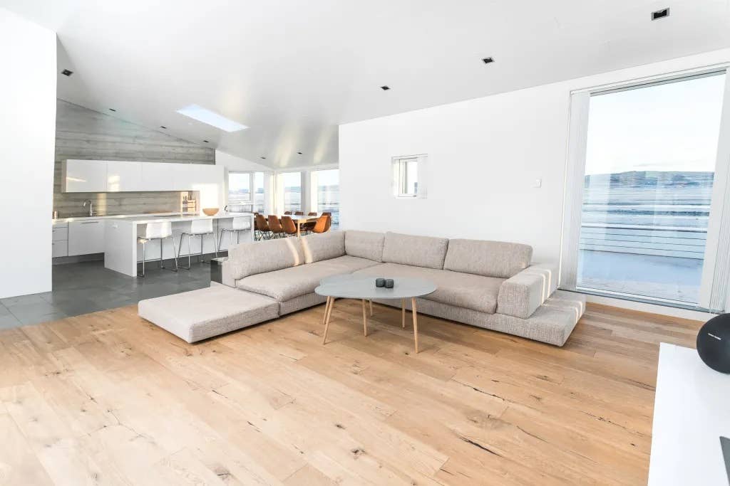 The living room in the Luxury Villa with River View has a lovely and comfortable couch.