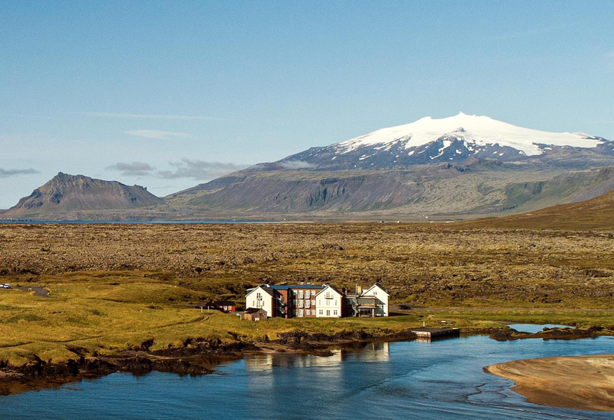 Hotel Budir in Iceland's Snaefellsnes Peninsula, with Snaefellsjokull glacier in the background.