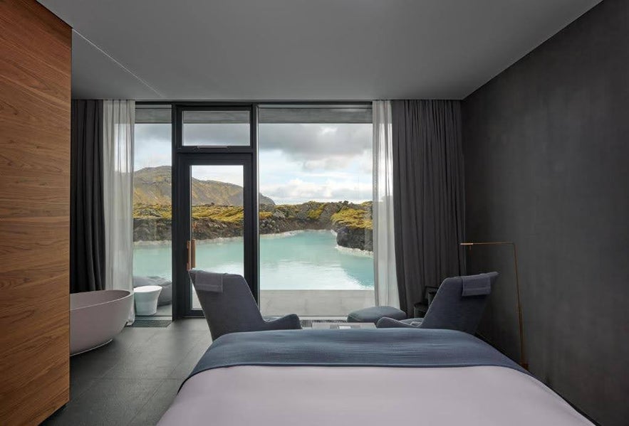 Lagoon-view room at The Retreat at Blue Lagoon Iceland with minimalist decor and private access to geothermal waters.