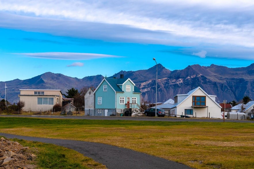 Houses in Hofn with views of the Vestrahorn mountains in Southeast Iceland.