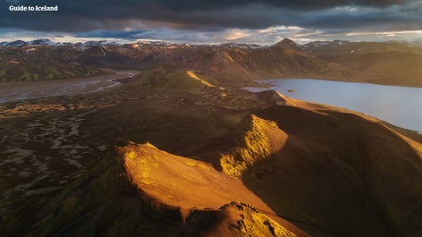 A beautiful lake surrounded by mountains in Iceland.