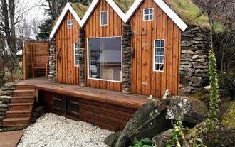 SJF Villa boasts an outdoor sauna housed in a traditional turf structure.