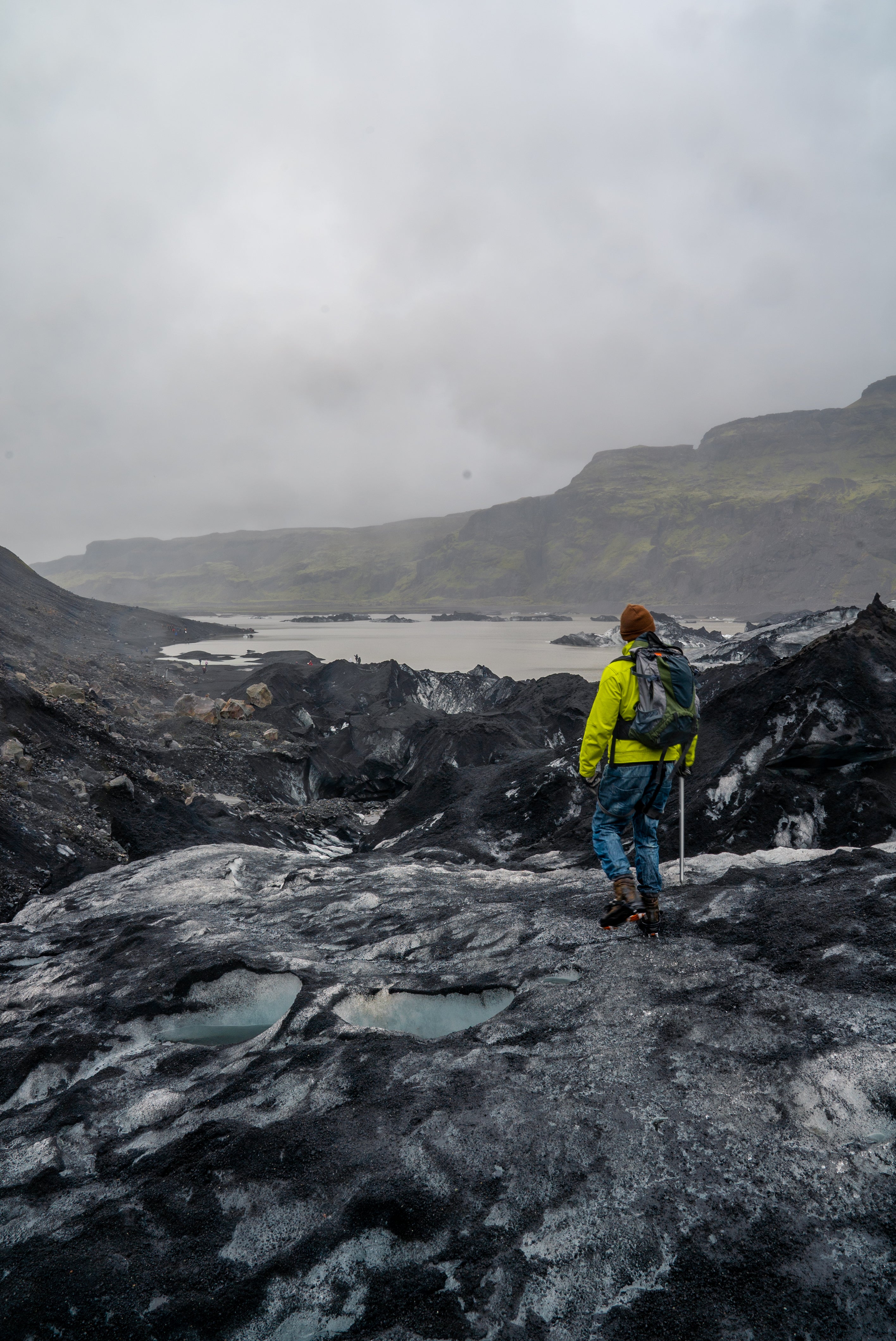 A traveler on a glacier hike on Solheimajokull in South Iceland.