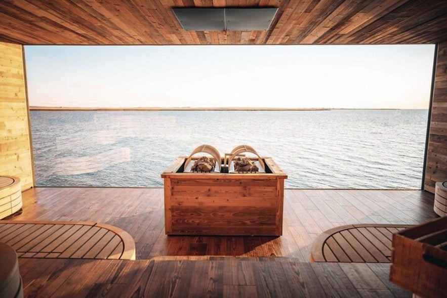 Sky lagoon sauna has a glass window towards the ocean