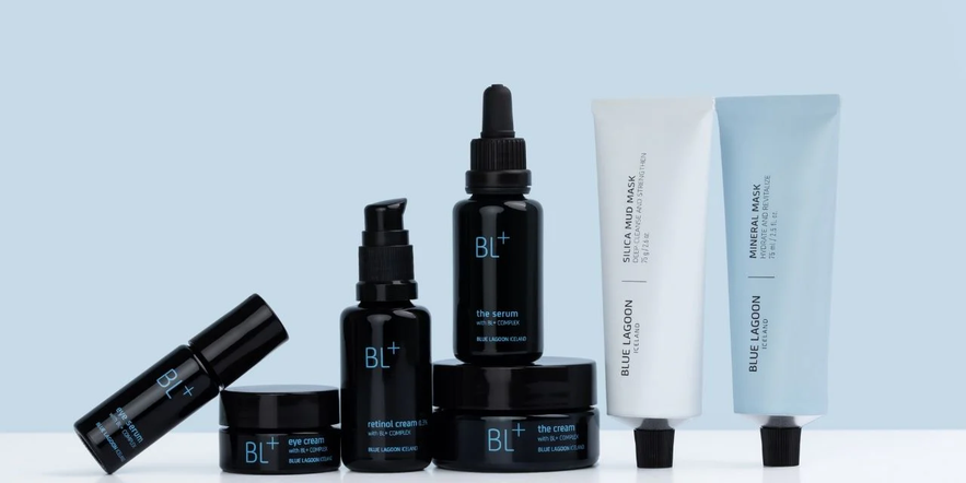 Blue Lagoon BL+ Skincare line features black jars and bottles paired with light blue and white tubes. Blue Lagoon BL+ Skincare line features black jars and bottles paired with light blue and white tubes.