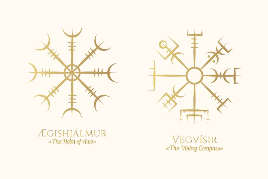 Gold Aegishjalmur (Helm of Awe) and Vegvisir (Viking Compass) staves shown side by side with their Icelandic names, contrasting protection and guidance.