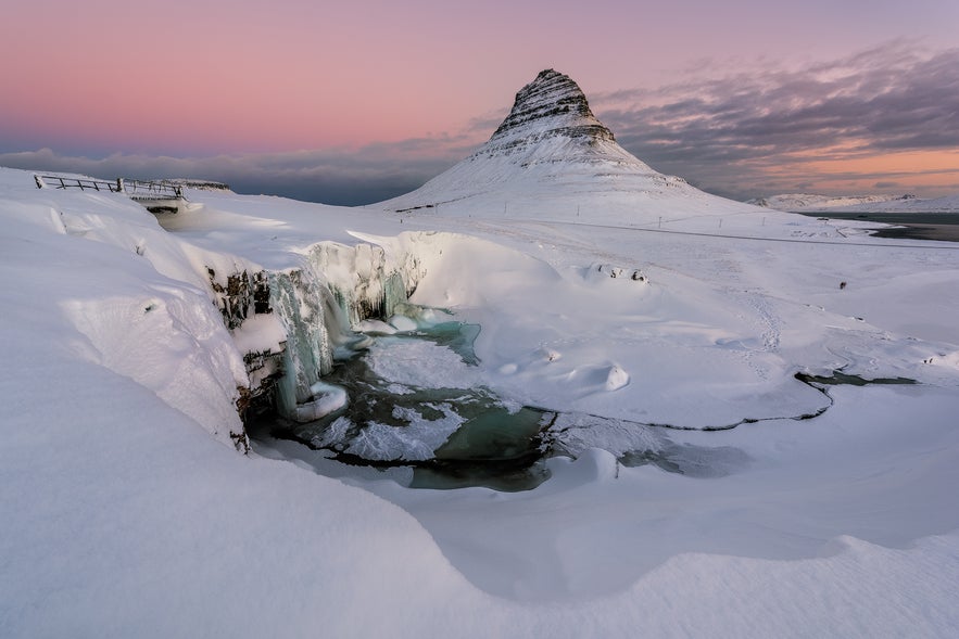 Kirkjufellsfoss waterfall during winter on the Snaefellsnes peninsula in Iceland