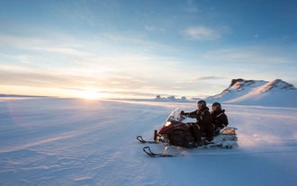 The snowmobile sits two people, including the driver.