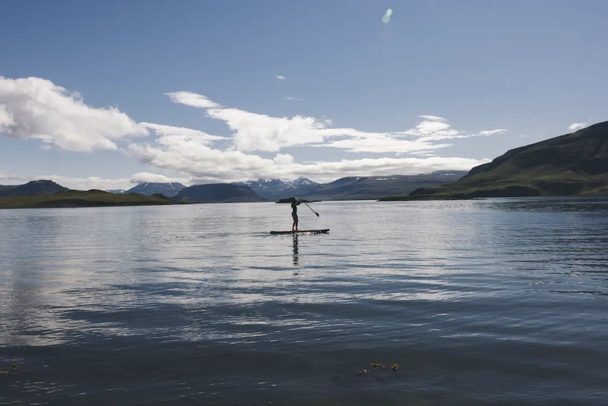 Paddle boarding is a popular activity in Iceland. 