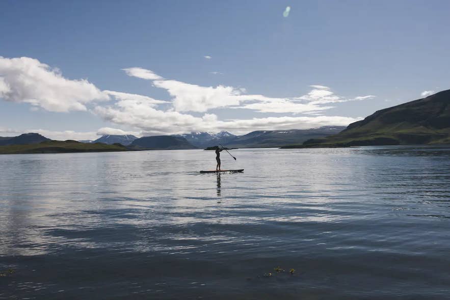 Paddle boarding is a popular activity in Iceland.
